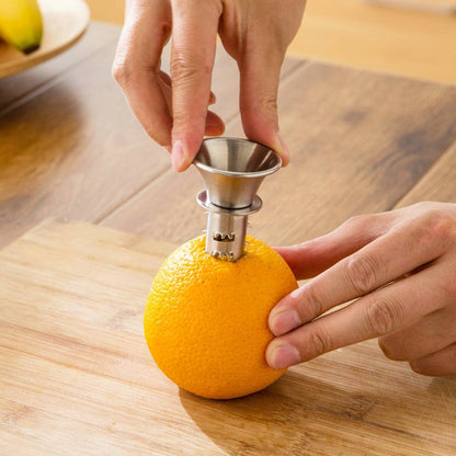 Citron- och apelsinpress i rostfritt stål