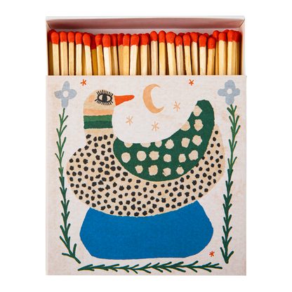 tändstickssask från archivist gallery med prickig fågel på blå sten, stjärnor och månar och blommor.