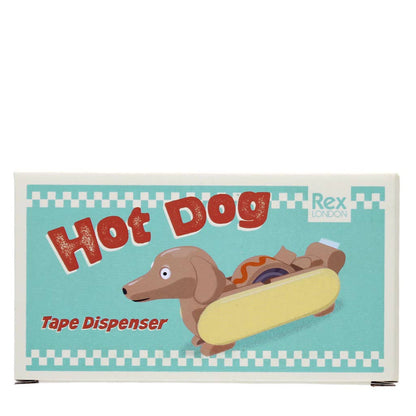 Quirky och nyskapande tejphållare, med en rolig design av en korvhund i ett bröd, med en skvätt ketchup längs den medföljande tejprullen. En rolig och funktionell kontorsartikel för en hundälskares arbetsplats eller till barnens pysselrum.