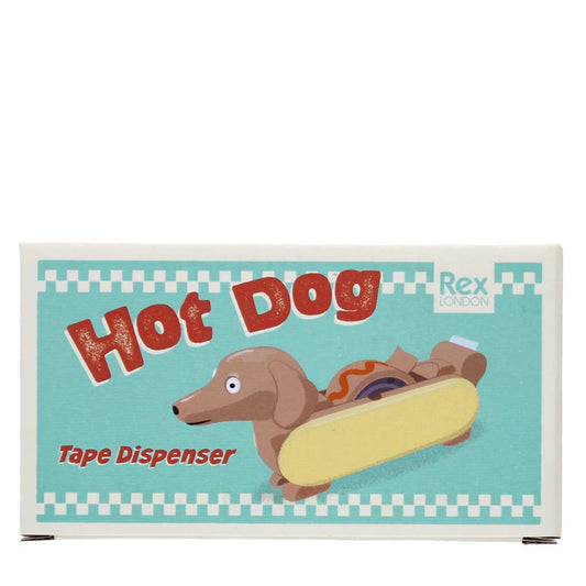 Quirky och nyskapande tejphållare, med en rolig design av en korvhund i ett bröd, med en skvätt ketchup längs den medföljande tejprullen. En rolig och funktionell kontorsartikel för en hundälskares arbetsplats eller till barnens pysselrum.